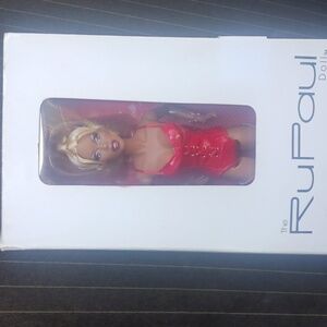 Ru Paul Doll. The box is not in new condition but the doll has not been opened.